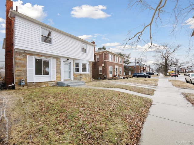 18212 Sorrento St, Detroit, MI 48235 - view of side of home with stone siding