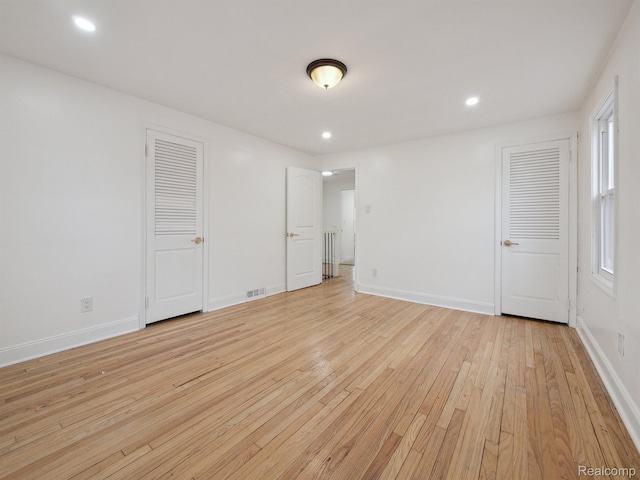18212 Sorrento St, Detroit, MI 48235 - unfurnished bedroom featuring light wood-type flooring, baseboards, and recessed lighting