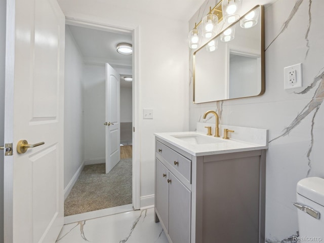 18212 Sorrento St, Detroit, MI 48235 - bathroom featuring vanity, baseboards, and toilet