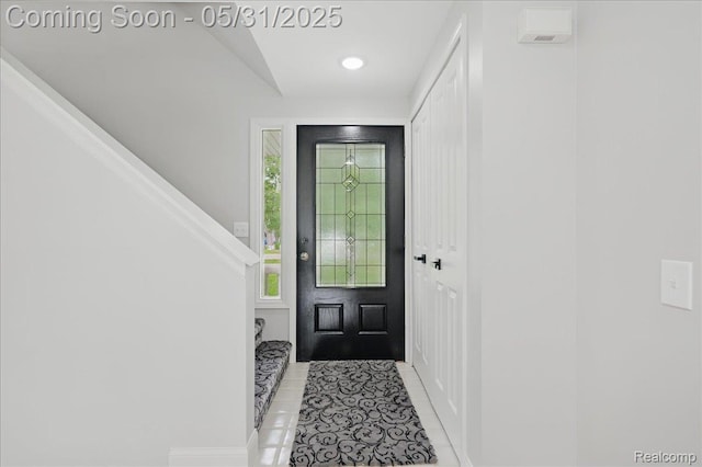 3004 Lansdowne Rd, Waterford, MI 48329 - entryway featuring light tile patterned floors, stairway, and recessed lighting