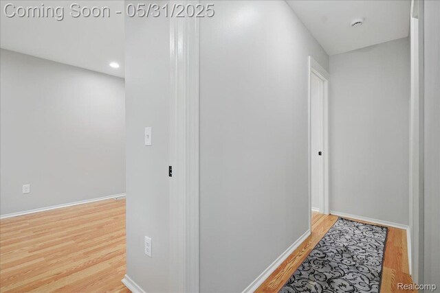 3004 Lansdowne Rd, Waterford, MI 48329 - corridor featuring wood finished floors and baseboards