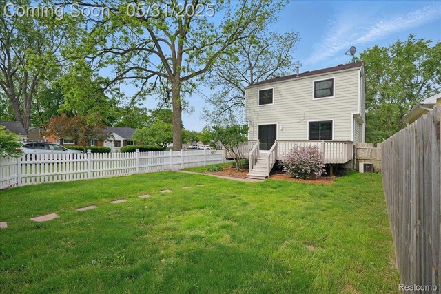 3004 Lansdowne Rd, Waterford, MI 48329 - back of house featuring a deck and central air condition unit