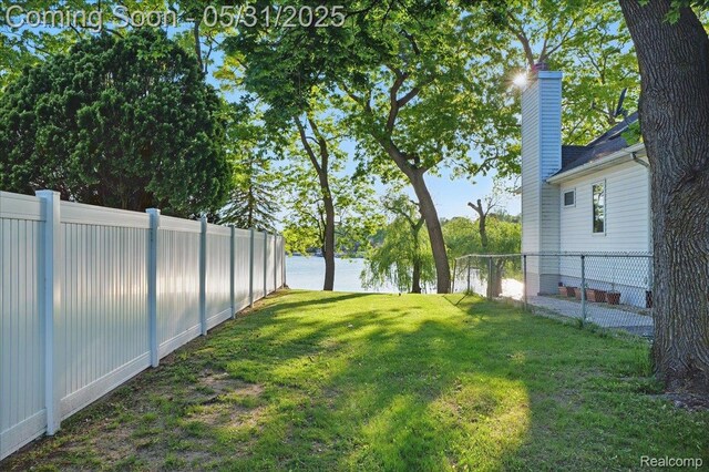 3004 Lansdowne Rd, Waterford, MI 48329 - view of yard with a water view