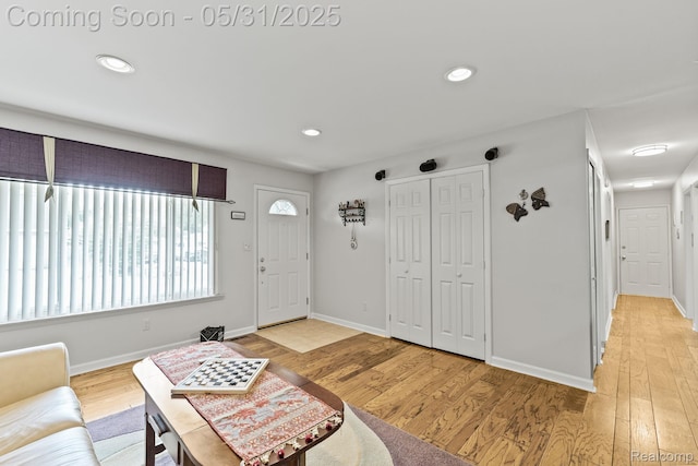 9220 Garden Ter, Commerce Twp, MI 48382 - living room with light wood-style floors, recessed lighting, and baseboards