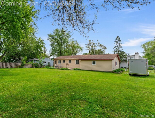 9220 Garden Ter, Commerce Twp, MI 48382 - view of rear view of house