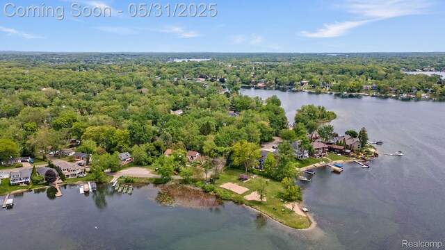 9220 Garden Ter, Commerce Twp, MI 48382 - view of property location featuring a heavily wooded area and a nearby body of water