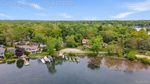 9220 Garden Ter, Commerce Twp, MI 48382 - drone / aerial view of a heavily wooded area and a large body of water