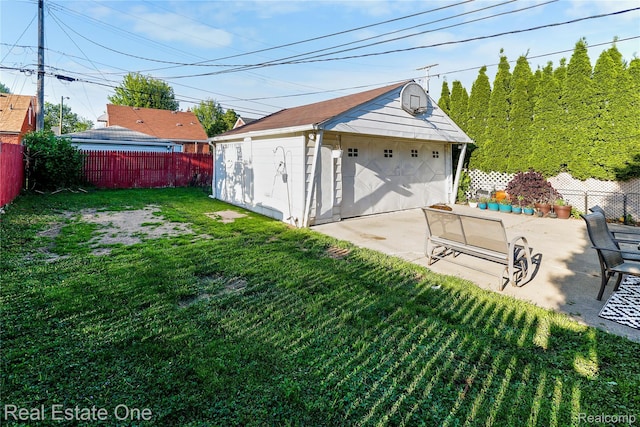 540 Champaign Rd, Lincoln Park, MI 48146 - view of yard with a patio area and a garage