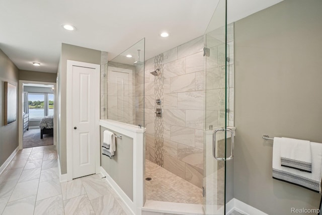 6652 Westminister St, Fenton, MI 48430 - full bathroom with ensuite bath, baseboards, a stall shower, marble look tiles, and recessed lighting