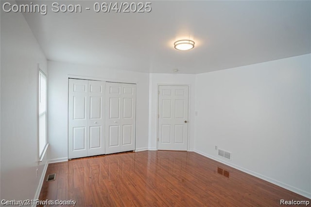 23060 Berdeno Ave, Hazel Park, MI 48030 - unfurnished bedroom with wood finished floors, a closet, and baseboards