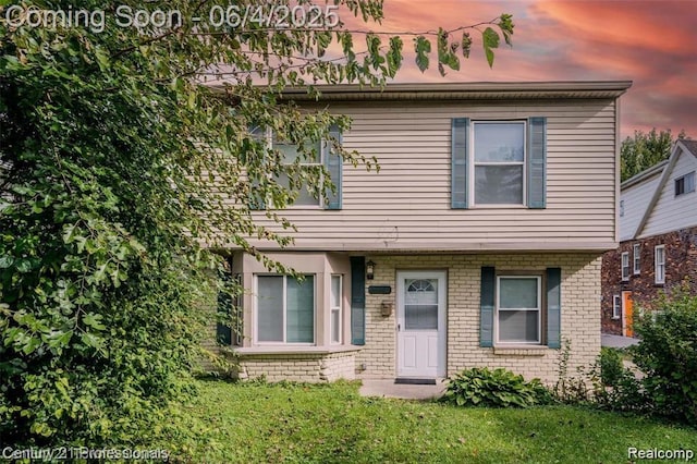 23060 Berdeno Ave, Hazel Park, MI 48030 - view of front of home with a lawn and brick siding