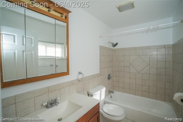 23060 Berdeno Ave, Hazel Park, MI 48030 - bathroom featuring tile walls, toilet, vanity, and bathing tub / shower combination