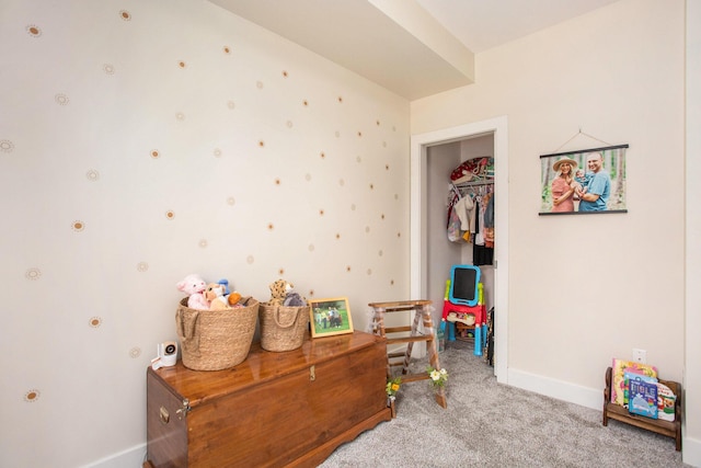 2159 New Town Dr NE, Grand Rapids, MI 49525 - recreation room featuring carpet flooring and baseboards