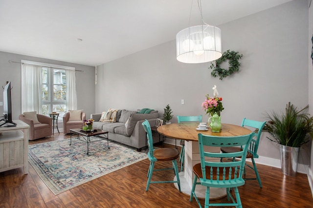 2159 New Town Dr NE, Grand Rapids, MI 49525 - living room featuring wood finished floors and baseboards