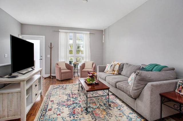 2159 New Town Dr NE, Grand Rapids, MI 49525 - living area featuring wood finished floors and baseboards