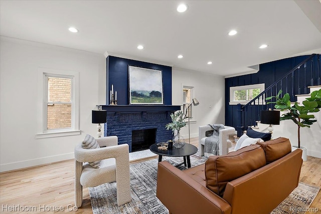 16514 Wildemere St, Detroit, MI 48221 - living room with stairs, light wood-type flooring, crown molding, baseboards, and recessed lighting