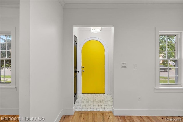 16514 Wildemere St, Detroit, MI 48221 - foyer featuring baseboards, healthy amount of natural light, and crown molding