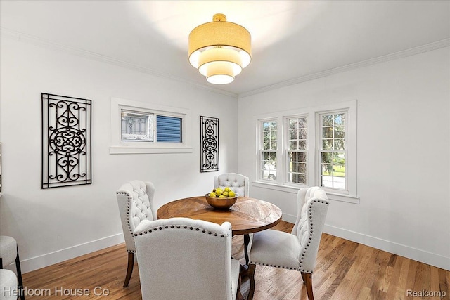 16514 Wildemere St, Detroit, MI 48221 - dining room with crown molding, baseboards, and light wood-type flooring
