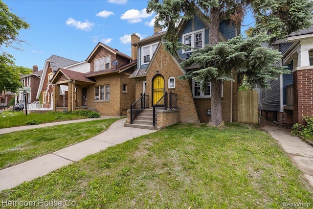 16514 Wildemere St, Detroit, MI 48221 - view of front of property with a front lawn and brick siding
