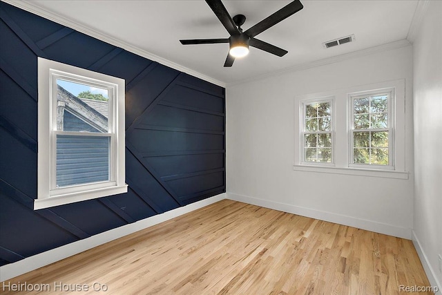 16514 Wildemere St, Detroit, MI 48221 - spare room featuring ornamental molding, baseboards, wood finished floors, and ceiling fan