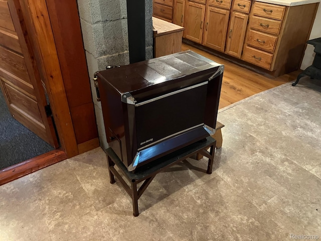 5400 Allen Rd, Alger, MI 48610 - detailed view of a wood stove