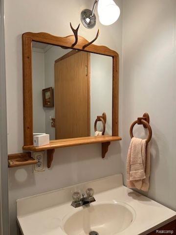 5400 Allen Rd, Alger, MI 48610 - bathroom featuring vanity