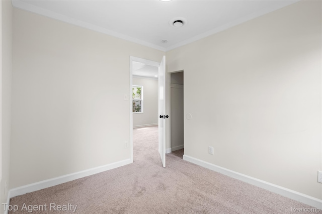 26041 Belanger St, Rochester, MI 48066 - carpeted empty room featuring baseboards and crown molding
