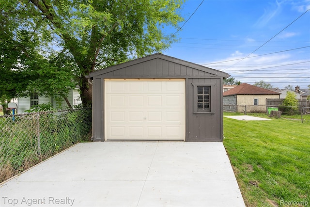26041 Belanger St, Rochester, MI 48066 - detached garage featuring driveway