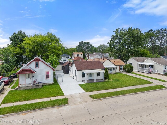 26041 Belanger St, Rochester, MI 48066 - bungalow featuring concrete driveway, a residential view, and a front yard