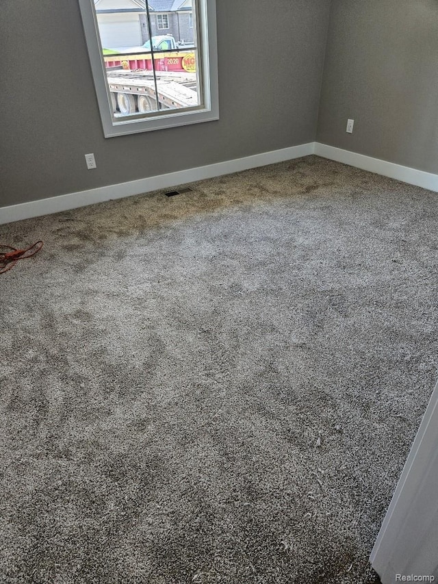 3059 Regatta Dr, St, MI 48079 - carpeted empty room featuring baseboards