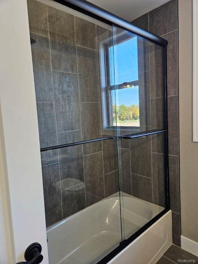 3059 Regatta Dr, St, MI 48079 - bathroom featuring shower / bath combination with glass door and tile patterned floors