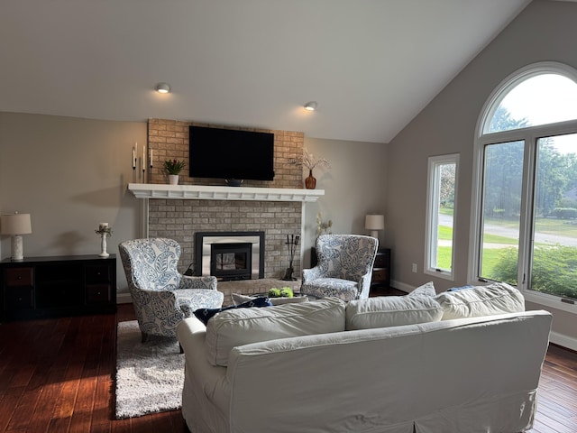 2032 Dean Dr, Washington, MI 48094 - living area with plenty of natural light, wood-type flooring, a fireplace, and high vaulted ceiling
