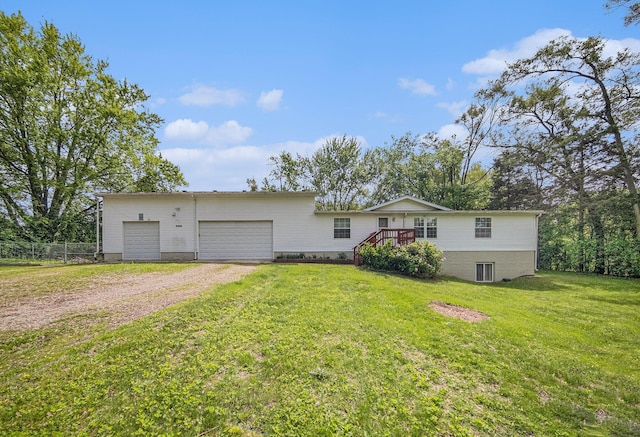 149 Hall St, Michigan Center, MI 49254 - ranch-style house featuring dirt driveway, central AC unit, and an attached garage