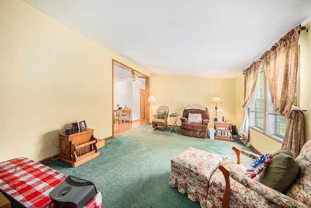 149 Hall St, Michigan Center, MI 49254 - living area featuring carpet flooring, ceiling fan, and baseboards