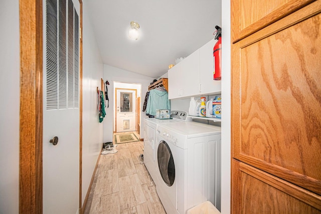149 Hall St, Michigan Center, MI 49254 - laundry room featuring cabinet space, a heating unit, washer and dryer, and baseboards
