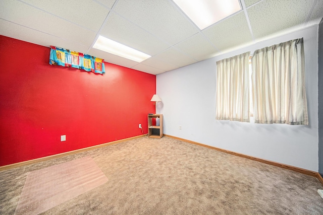 149 Hall St, Michigan Center, MI 49254 - carpeted spare room featuring a drop ceiling and baseboards