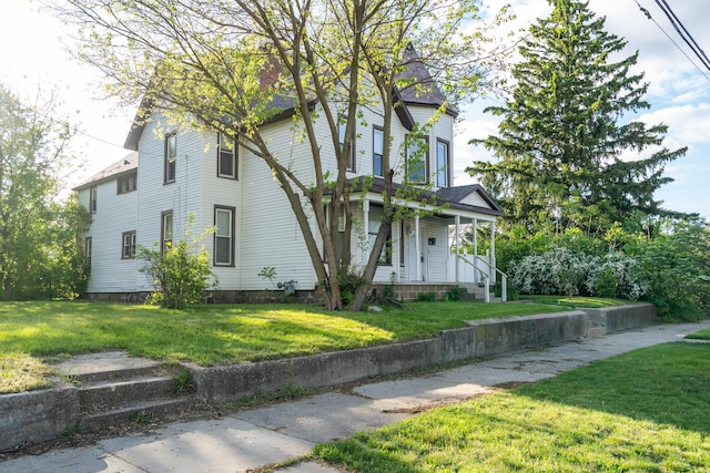 1007 Ionia Ave SW, Grand Rapids, MI 49507 - view of front of property featuring a front lawn and a porch