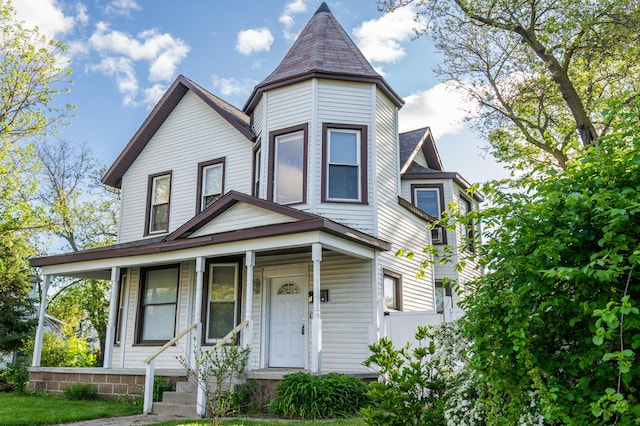 1007 Ionia Ave SW, Grand Rapids, MI 49507 - victorian-style house with a porch