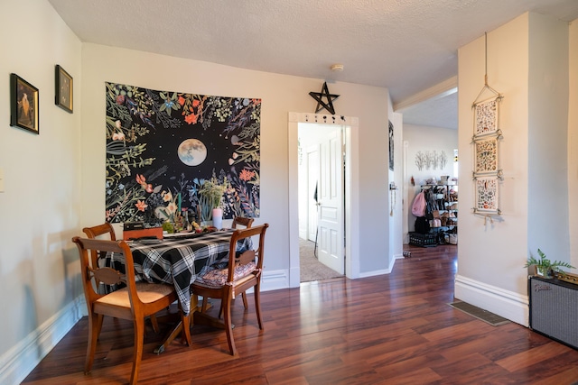 1007 Ionia Ave SW, Grand Rapids, MI 49507 - dining room featuring wood finished floors, baseboards, and radiator heating unit
