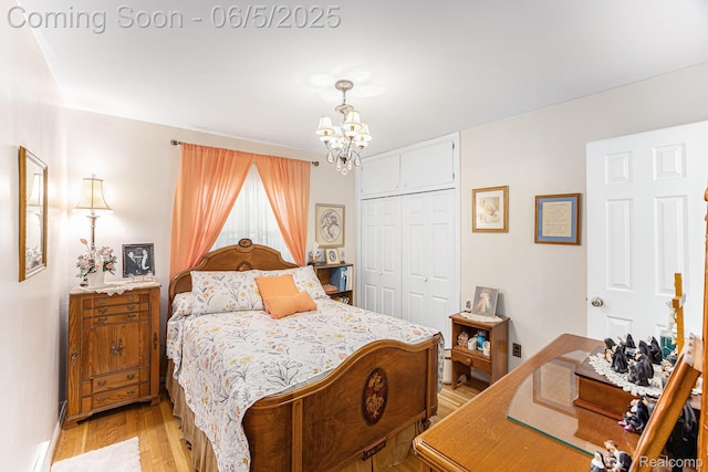 15025 Kipke, Redford, MI 48239 - bedroom with a chandelier, light wood-type flooring, and a closet