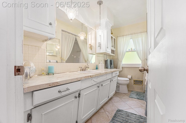 15025 Kipke, Redford, MI 48239 - bathroom featuring vanity, toilet, tile patterned floors, and backsplash