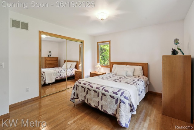 4333 Running Deer Trl, Pigeon, MI 48755 - bedroom featuring a closet and wood finished floors