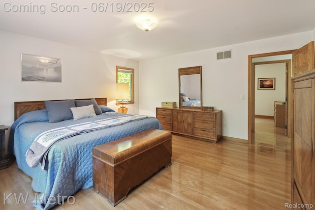 4333 Running Deer Trl, Pigeon, MI 48755 - bedroom featuring light wood-type flooring and baseboards