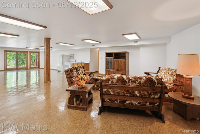 4333 Running Deer Trl, Pigeon, MI 48755 - living room featuring decorative columns