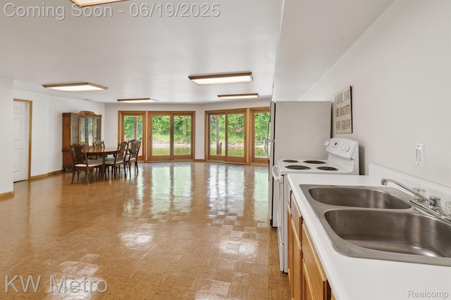 4333 Running Deer Trl, Pigeon, MI 48755 - kitchen with white electric stove and light countertops