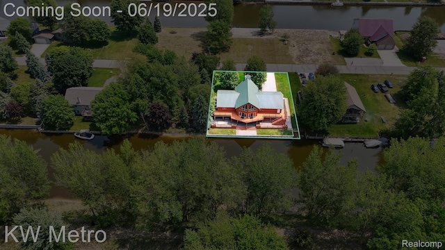 4333 Running Deer Trl, Pigeon, MI 48755 - aerial view of property and surrounding area featuring property parcel outlined and a nearby body of water