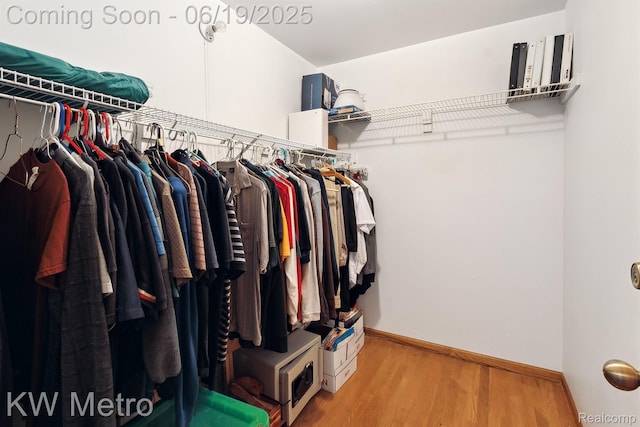 4333 Running Deer Trl, Pigeon, MI 48755 - spacious closet featuring wood finished floors