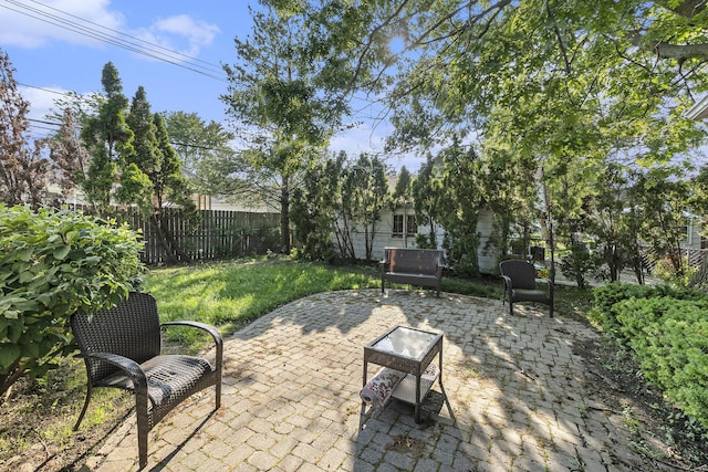 21406 Broadstone St, Harper Woods, MI 48225 - fenced backyard with a patio