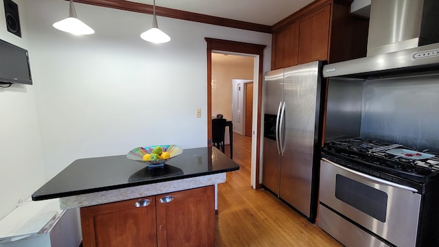 21406 Broadstone St, Harper Woods, MI 48225 - kitchen with wall chimney exhaust hood, appliances with stainless steel finishes, light wood-type flooring, hanging light fixtures, and crown molding