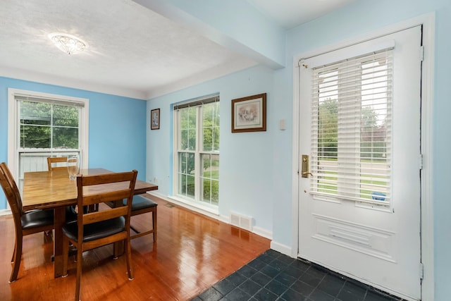 15501 E Jefferson Ave, Grosse Pointe Park, MI 48230 - dining room with plenty of natural light, baseboards, and dark wood-type flooring
